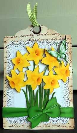 Pretty yellow daffodils on lace with butterfly on a tag by Elaine  Harmer