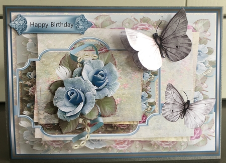Blue rose and butterfly by Elaine  Harmer