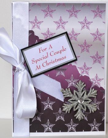 Christmas Flourish Stars in Dusky Pinkand Silver Backgrounds by Elaine Thompson