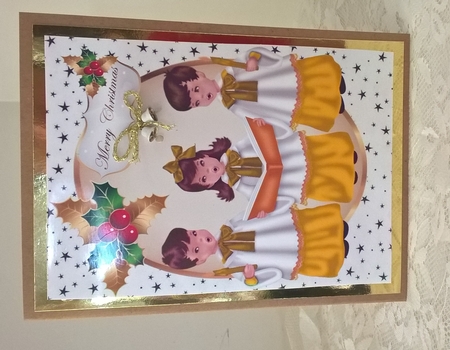 Carol Singers in Gold in Oval Frame with Stars A4 by Elaine Yallop