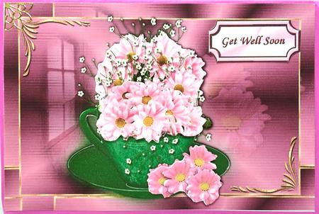 Pink Chrysanthnum in a Teacup by Elena Pavlova