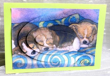 Beagle Puppies Asleep on the Sofa Oval Pyramid by Elisabeth Le Clainche