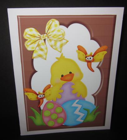 Little Chick with Easter Eggs in Chocolate Frame A4 by Elizabeth A Sanders