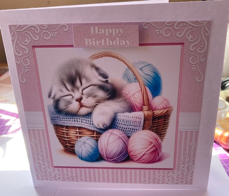 Sleeping Kitten In A Basket of Wool by Lizzie Hartwell