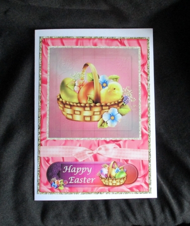Easter basket with chick, eggs and flowers by Lizzie Hartwell