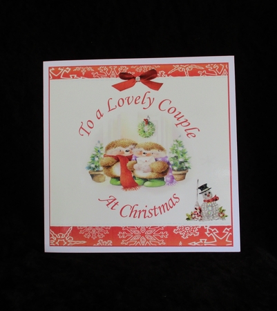 TO A LOVELY COUPLE AT CHRISTMAS by Lizzie Hartwell