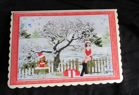 Winter scene with girl in Santa dress by Lizzie Hartwell
