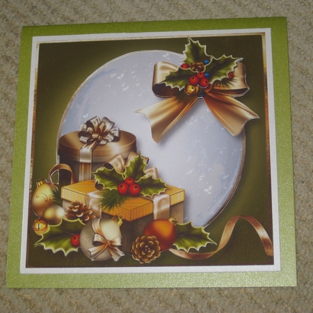 Golden Christmas Presents Snow Globe by Ellen Morgan