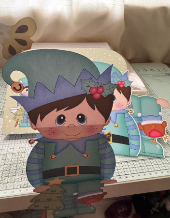3D On the Shelf Card Kit - Christmas Little Boy Elf brings home the Christmas Tree by Erika Sissons