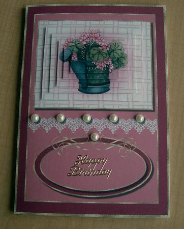 Geranium Pyramid in Watering Can Topper by Eunice Roberts