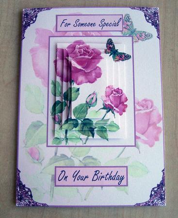4 Pink Roses and a Butterfly by Eunice Roberts