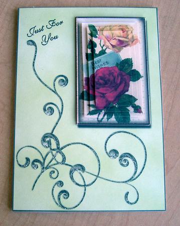 Red and Yellow Roses Framed with a Green Flourish by Eunice Roberts