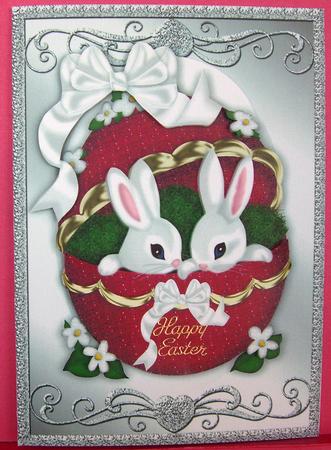 Little White Easter Bunnies in Red Ornate Egg A4 by Eunice Roberts