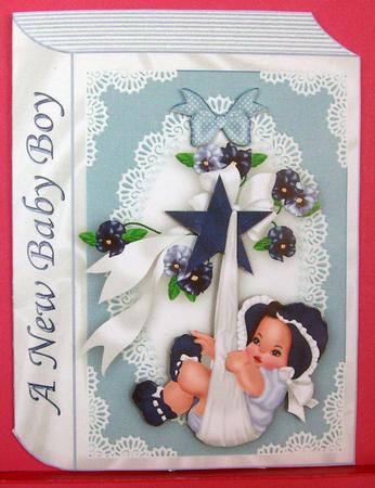 Sweet Baby Boy in Lace Frame on Folded Book by Eunice Roberts