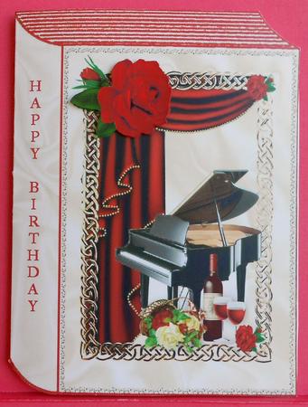 Red Roses, Piano, and Champers with Drape Folded Book by Eunice Roberts