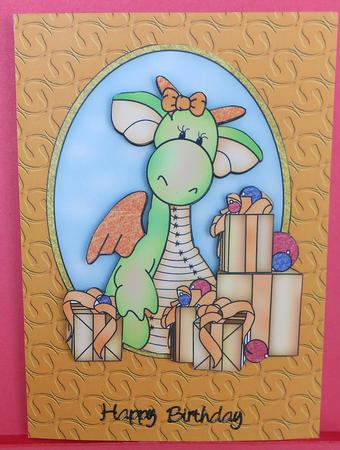 Penny Dragon with Presents Coloured by Eunice Roberts