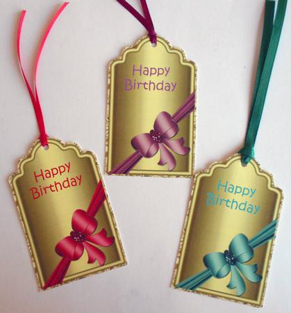 Large Metallic Tags with Bow by Eunice Roberts
