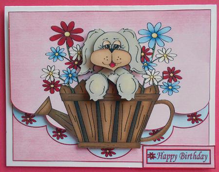 Puppy in Flower Trough by Eunice Roberts