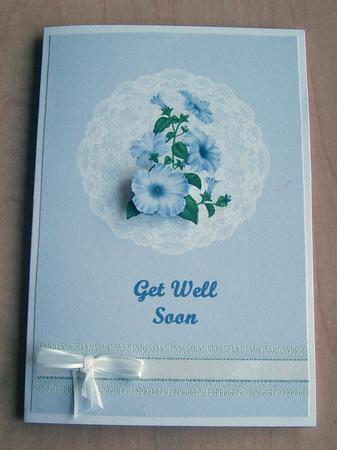 Blue Petunia on Lace by Eunice Roberts