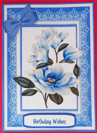 Lovely Blue Magnolias on Fine Lace  by Eunice Roberts