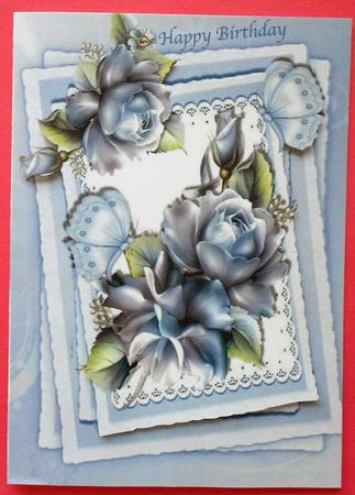 Pretty Blue Roses and Butterflies on Lace A4 by Eunice Roberts