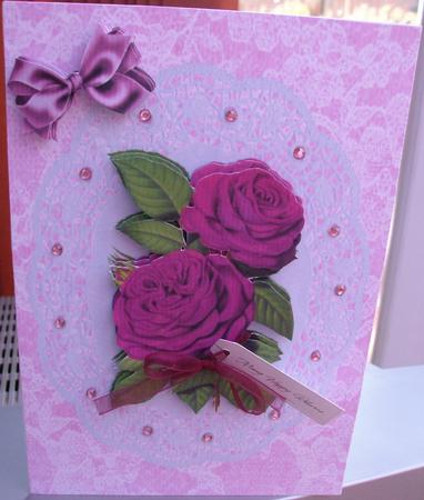 Beautiful Cerise Roses on Lace Dollie by Eve Bartlett