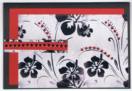 Black Flower on Embossed Silver Backing Paper by Eve Mcmean