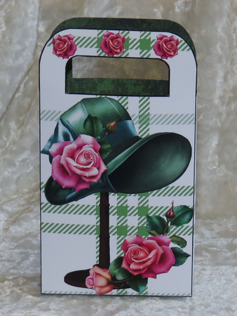 Pretty vintage hat on stand with pink roses gift bag by Faye Volo