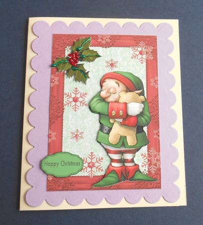 Lovely Little Christmas Elf Cuddling a Bear by Fran Turner
