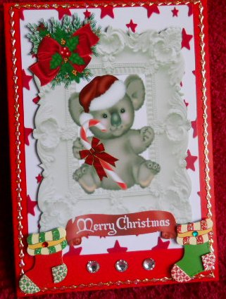 Koala with Stars, Bows, in Ornate Frame A4 by Gail Pennycuick