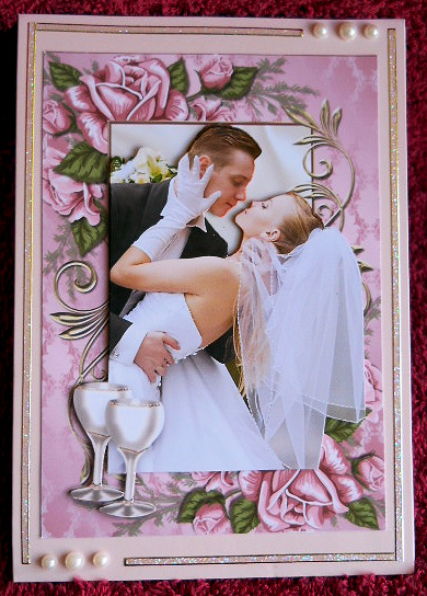 Wedding Couple in Rose Frame with Champers A4 by Gail Pennycuick