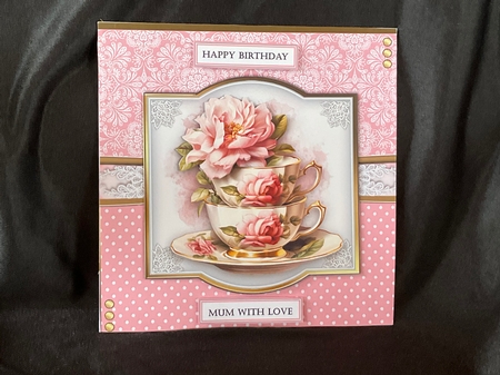Teacups and flowers by Geraldine Harbour