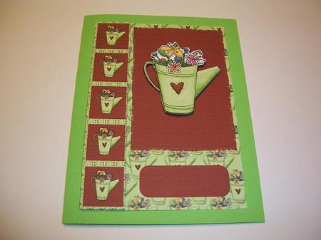 Watering Can with Flowers by Geri Stringer