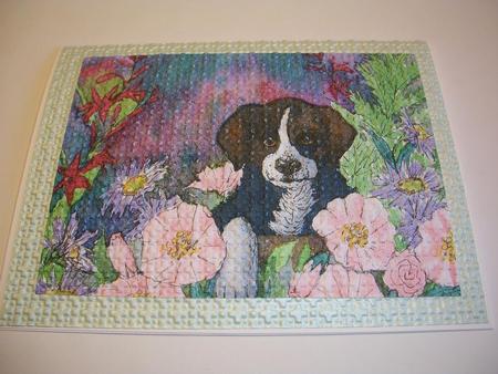 Puppy Hiding in the Garden by Geri Stringer