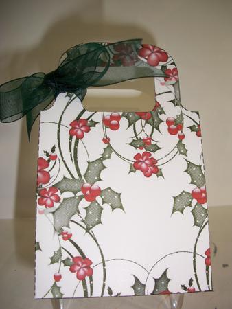 Holly and Poinsettias Christmas Gift Bag by Geri Stringer