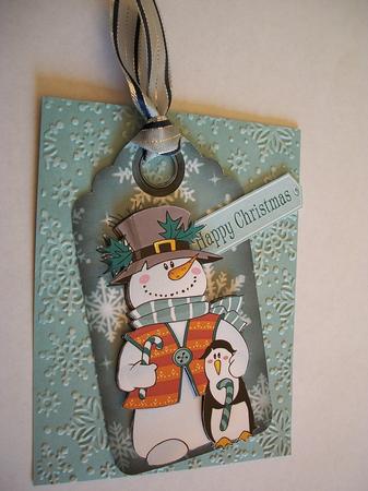 Snowman with Penguin on Snowflake Tag by Geri Stringer