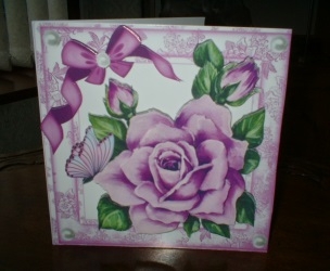 pretty painted big lilac rose, with  bow and butterflies by Gill Dean