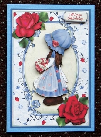 Girl with Flowers in Blue Card Front by Giselle Topper