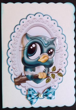 Cute Little Turq Owl on a Branch by Gitte Jensen