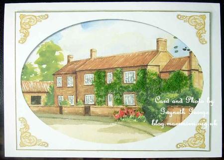 Pretty Cottage in Oval Frame with Gold Ornate Corners by GWYNETH GEORGE