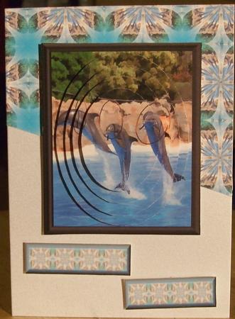 Dolphins Oval Pyramid with Background by GWYNETH GEORGE