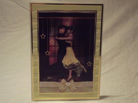Gold Ballroom Dancers Featured Gallery Photo
