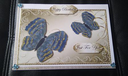 Two Blue Butterflies Topper 2 by Hayley Griffiths