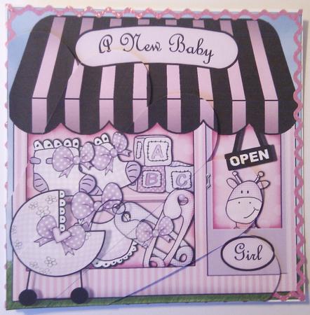 The Little New Baby Girl Shop Fan Pyramage Topper by Hayley Griffiths