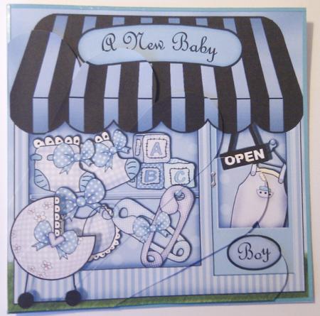 The Little New Baby Boy Shop Fan Pyramage Topper by Hayley Griffiths