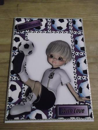 Boy Sitting Down Playing Footie in Purple by Hayley Griffiths