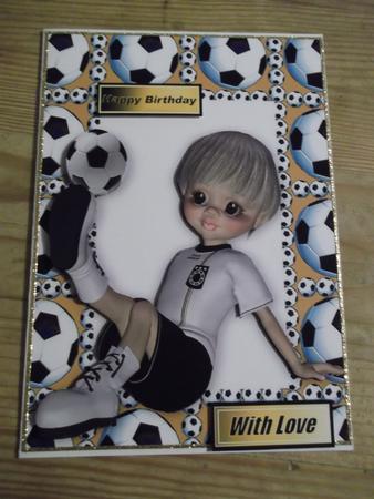Boy Sitting Down Playing Footie in Gold by Hayley Griffiths