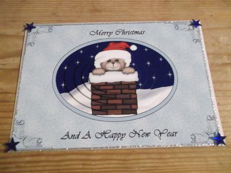 Christmas Teddy Down the Chimney by Hayley Griffiths