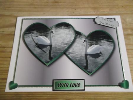Beautiful Swans in Hearts - Emerald by Hayley Griffiths