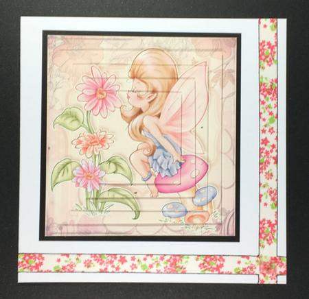 Faerie Sitting on a Mushroom Kissing a Flower by Hazel Pepper
